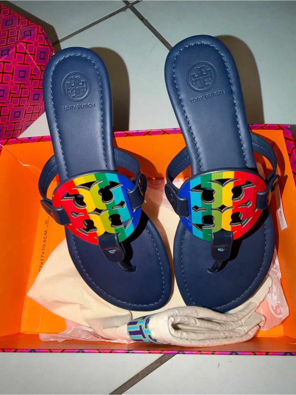 Tory Burch Navy Flip Flops with Rainbow Logo Medallions